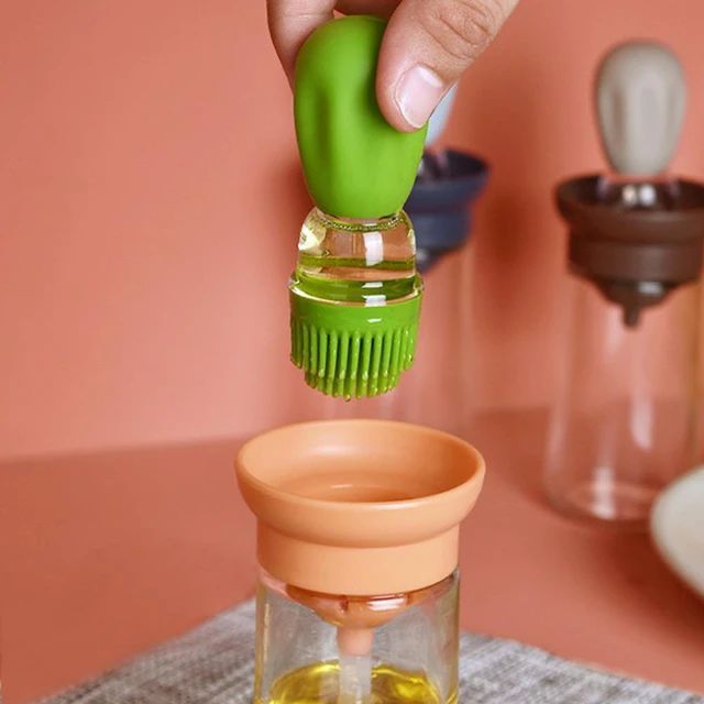 BOTELLA DE ACEITE CON BROCHA DE SUCCIÓN