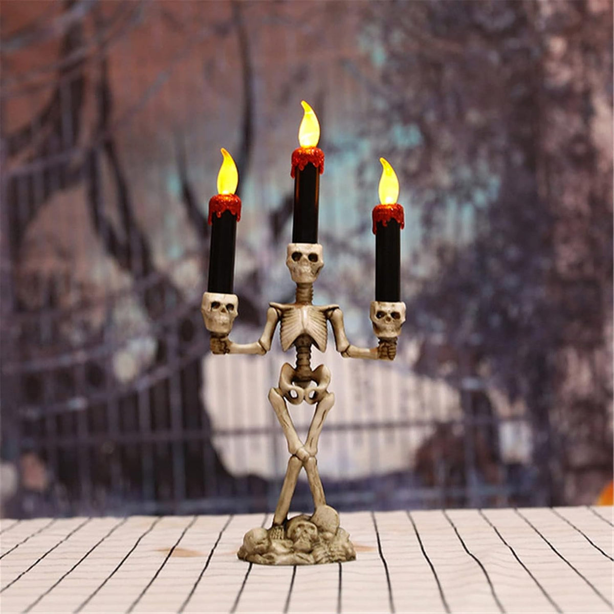 CANDELABRO DE ESQUELETO CON 3 VELAS LED HALLOWEEN